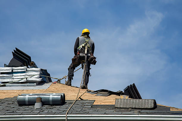 Professional Roofing technician working in Richland, IN
